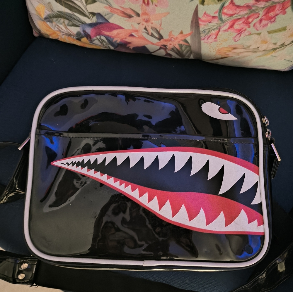 Stylish Black Crossbody Bag with Bold Design